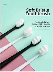 Detail showing dense micro-fine bristles of black and white manual toothbrushes