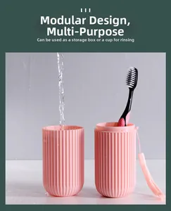 Pink portable travel wash cup with split design for storage and bathroom use