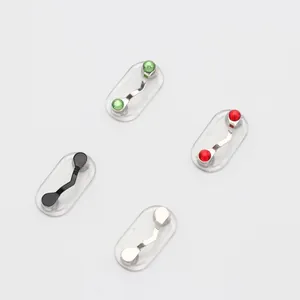 Detail view of V-shaped magnetic eyeglass holders with colorful gemstone finishes