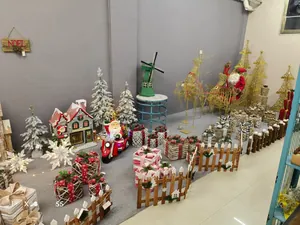 Close-up of Christmas decor set featuring LED light boxes and Santa on a motorcycle
