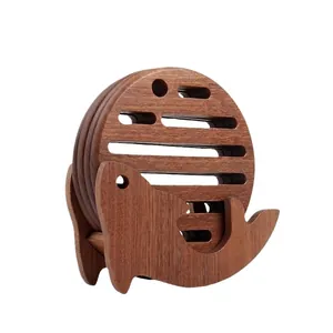 Creative ebony wood heat-insulating coaster set with a cute whale shaped holder