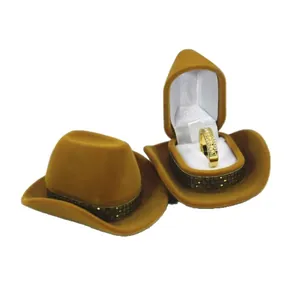 Cowboy hat shaped velvet ring box in brown with a checkered band and white interior lining