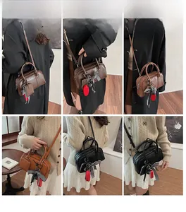 Chic women's bowling bag in multiple colors shown with crossbody and handbag styling