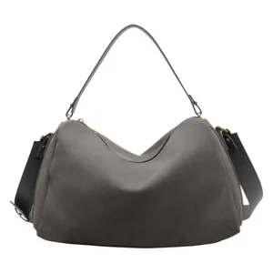 Dark gray suede pillow bag with dual straps and matte finish for women's daily commute
