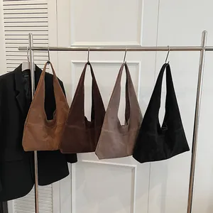 Retro suede large tote bag in caramel, brown, taupe and black colors hanging set