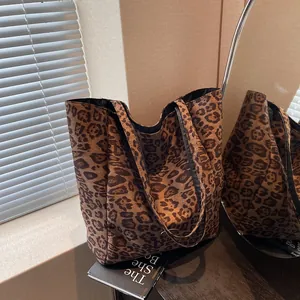 Large leopard print plush tote bag for women with dual handles for daily commute