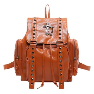 Vintage orange rivet backpack with metal cross pendant and pebble grain faux leather