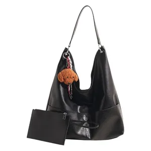 Minimalist black PU leather hobo tote bag with teddy charm and matching small pouch