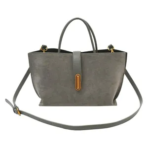 Retro grey suede tote bag with golden buckle and adjustable crossbody strap for women