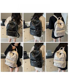 Quilted puffer backpack for women showing multi-angle model views in black and silver