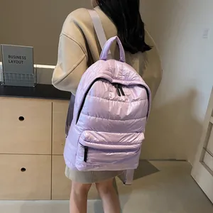 Lavender quilted puffer backpack for women featuring large capacity and lightweight nylon fabric