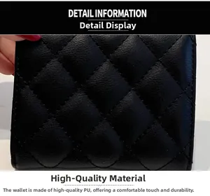 Gros plan sur la texture en cuir PU matelassé noir et les coutures précises du petit portefeuille