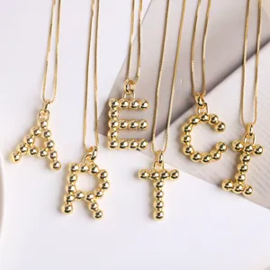 18K gold plated necklace featuring bubble beaded initial pendants on a box chain