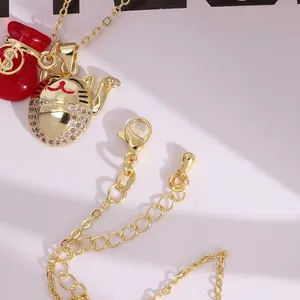 18K vergulde gelukskat ketting met zirkonia hart en rode gelukszakje hanger voor dames