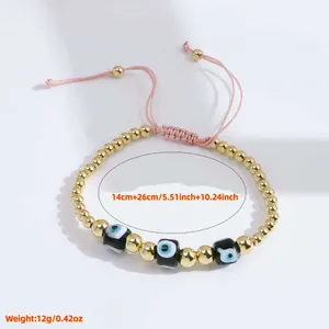 Detail of adjustable evil eye bracelet showing length of 14cm to 26cm and gold beads