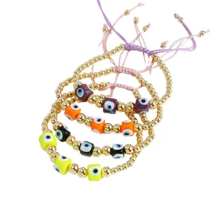 Set of four 18K gold-plated Evil Eye beaded bracelets with adjustable woven cords