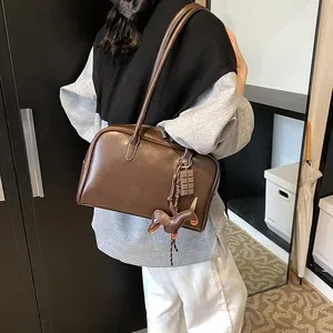 Vintage brown bowling shoulder bag with cute dachshund and chocolate pendants for women