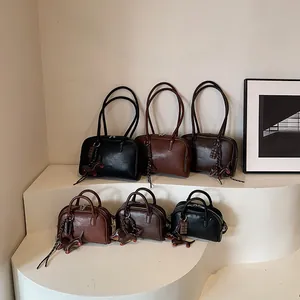 Retro faux leather bowling bags in black, brown and tan with cute puppy charm accents