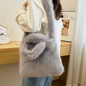 Plush light grey faux fur tote bag for women featuring dual shoulder and hand straps