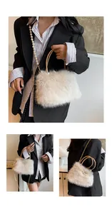 Detail view of plush faux fur handbag featuring pearl gold chain and ring handles
