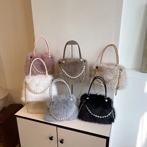 Plush faux fox fur handbags in six colors with pearl straps and metal chains