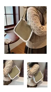 Detail of olive green suede shoulder bag with white faux shearling trim and slim strap