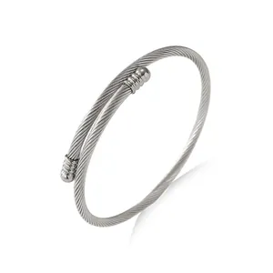 Elegant silver stainless steel twisted cable bracelet with decorative ball end caps