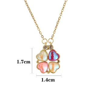 Collar de trébol dorado con gemas de colores en forma de corazón y guía de tallas