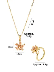 Detailed view of gold flower jewelry set featuring zircon pendant and adjustable ring