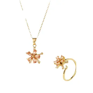 Rotating zircon flower jewelry set with necklace and adjustable ring in gold finish