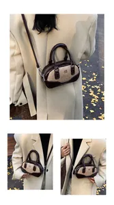 Detail of vintage stitching and textured fabric on a retro leather bowling bag