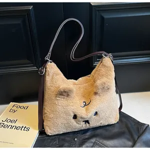 Close-up of soft lamb wool tote bag with cute animal embroidery and leather strap