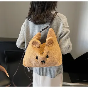 Close-up of the capybara plush bag featuring soft faux fur and embroidered facial details