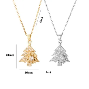 Rotating snowflake Christmas tree necklace in gold and silver steel with zircons