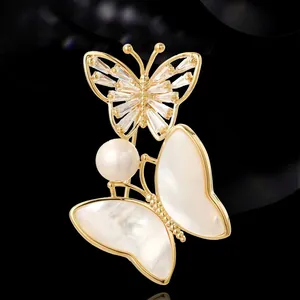 Franse vintage dubbele vlinderbroche met parelmoer vleugels en zirkoon inleg