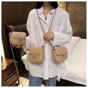 Detailed comparison of beige quilted chain bags in three sizes for various styling options