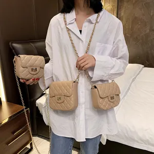 Beige quilted crossbody chain bags in three sizes shown on a model for size comparison