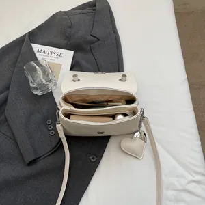 White lychee pattern leather square bag with double inner layers and heart pendant