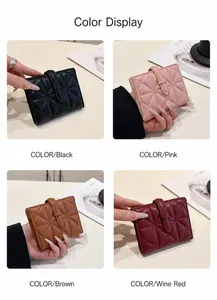 Dettaglio colori dei portafogli trapuntati in nero, rosa, marrone e rosso vino