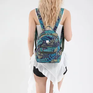 Sac à dos tendance léger avec imprimé feuilles tropicales et toile résistante