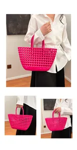Close-up of pink woven jelly basket bag featuring hollow geometric mesh design