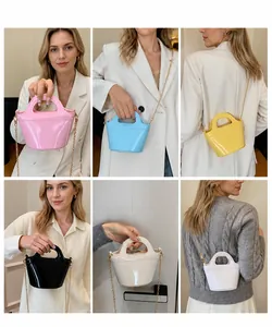 Collage of mini jelly bucket bags in six colors with gold chain straps and top handles