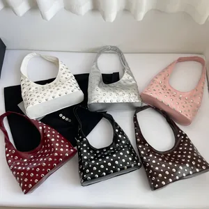 Chic crescent hobo bag with metallic studs available in six stylish fashion colors