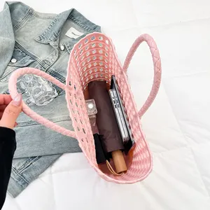 Pink woven macaron jelly tote bag with hollow grid design and large capacity space