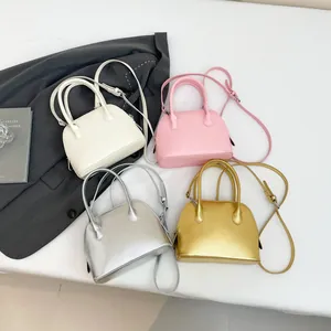 Sacs bandoulière minimalistes en forme de coquille en quatre couleurs avec doubles poignées