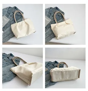 Detailed views of cream nylon tote bag with reinforced base and smooth metal closure