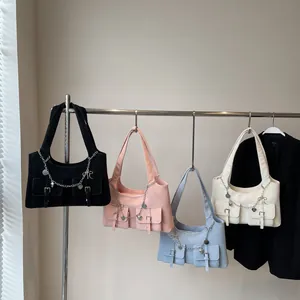 Minimalist large-capacity tote bags in black, pink, blue, and white with silver chains