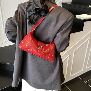 Fashionable red patent leather crescent moon bag with silver studs for women