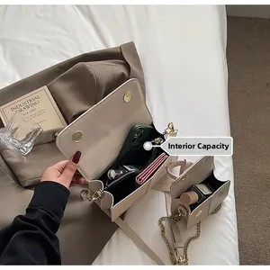 Internal capacity of contrast retro square bag with phone and perfume storage space