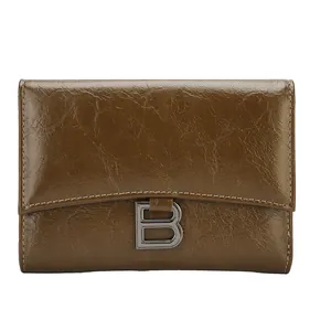 Retro brown polished leather tri-fold wallet for women with silver B-logo metal buckle